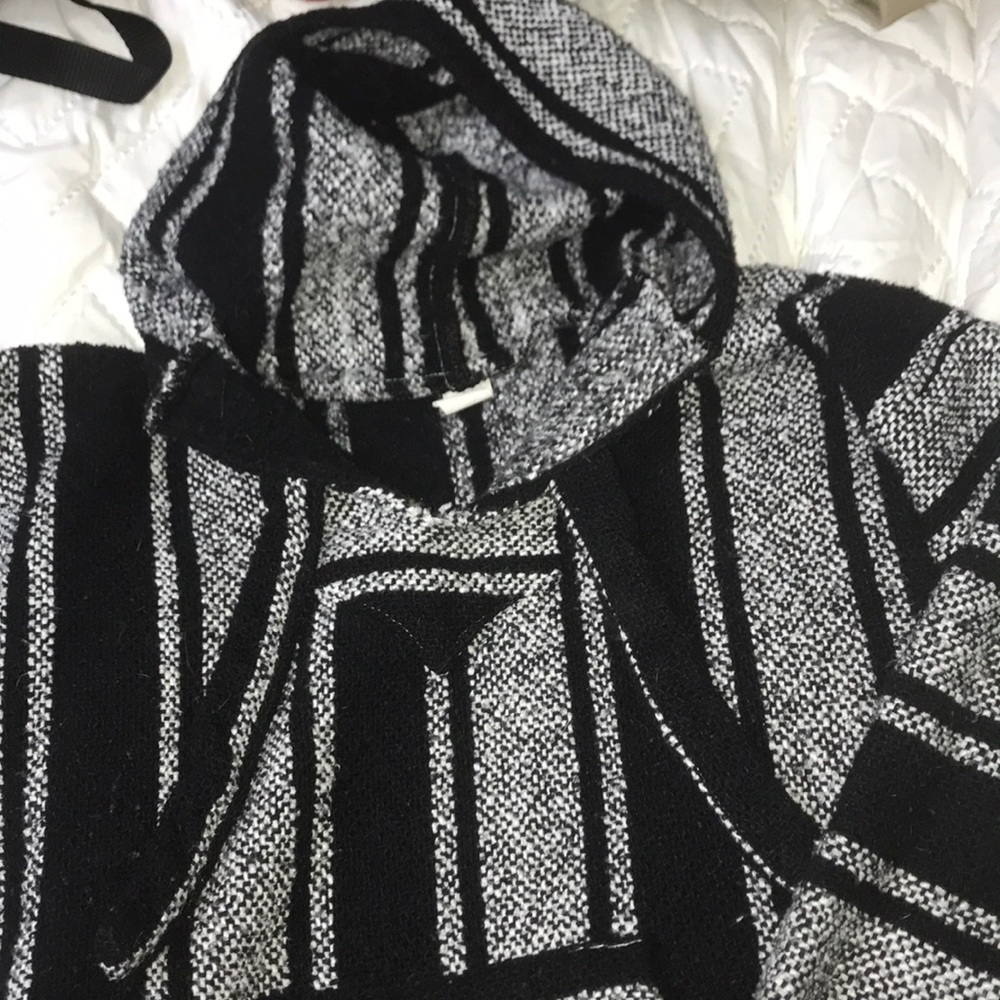 black and white hooded sweatshirt.